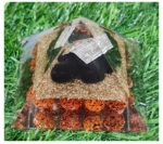 Rudraksha with Turtle Orgone Pyramid is a harmonious blend of sacred Rudraksha beads and the mystical Orgone Pyramid with a turtle motif.